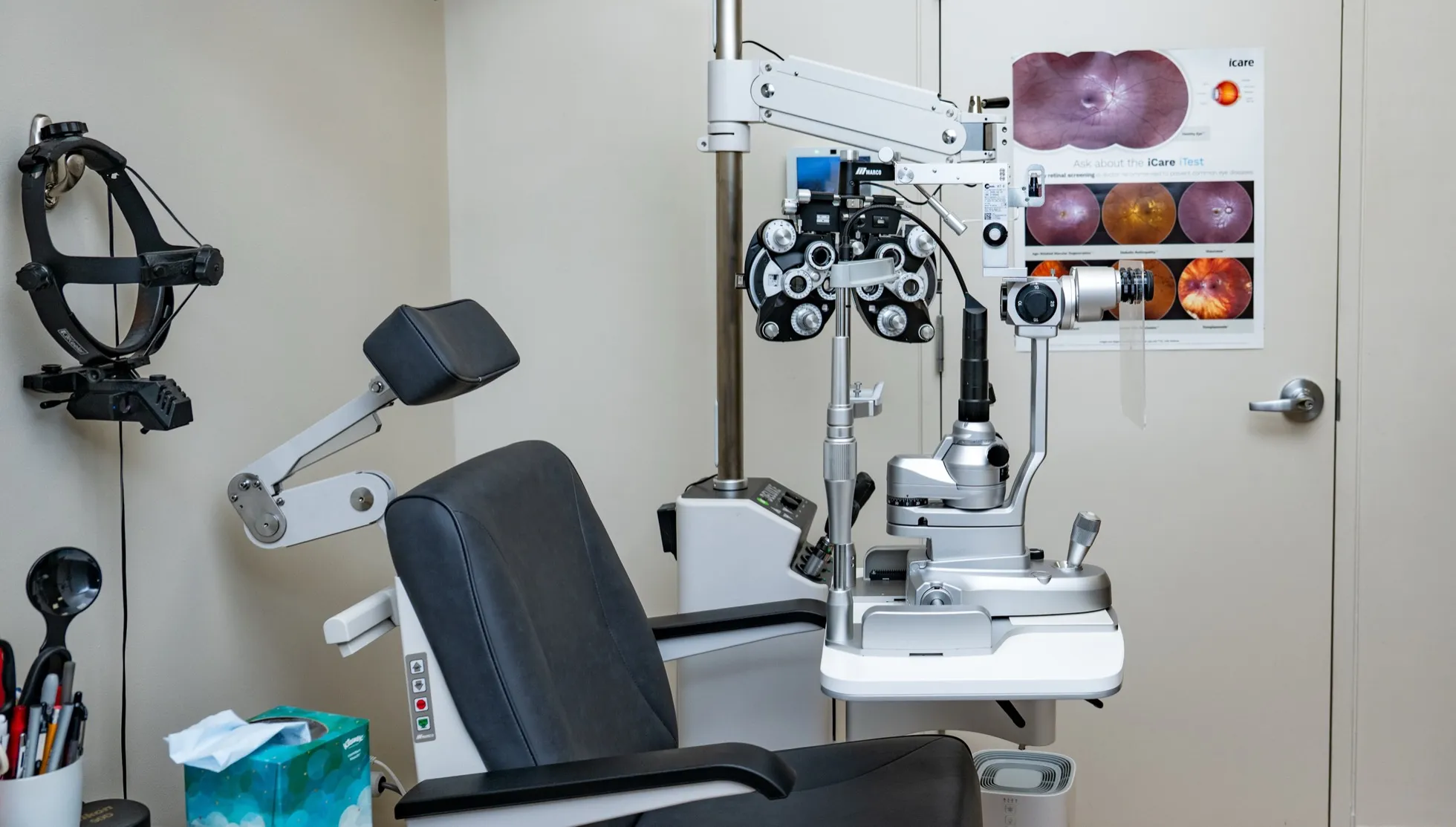 A Voorthuis eye exam room with a phoropter, slit lamp, and exam chair.