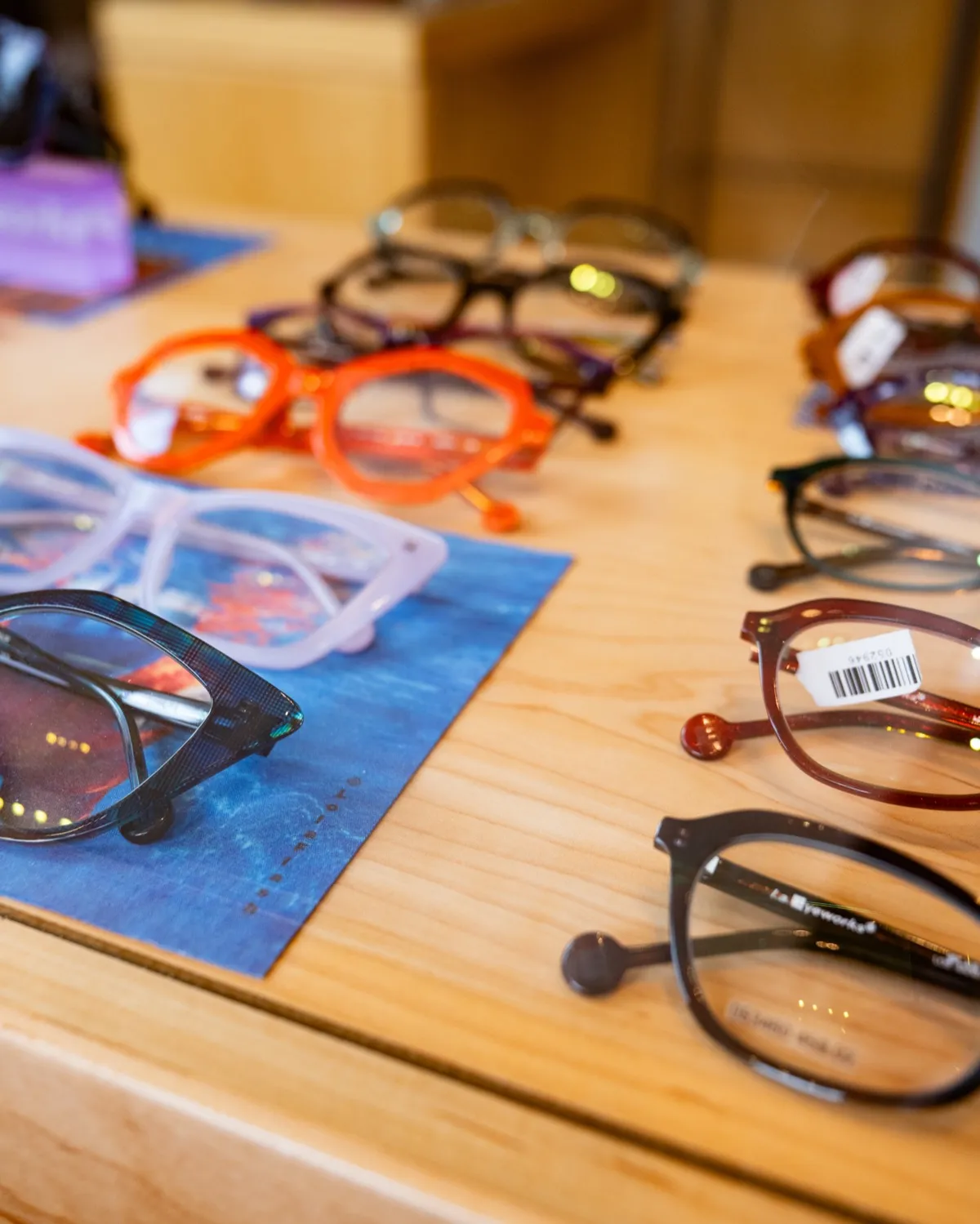 Designer acetate frames laid out at Voorthuis
