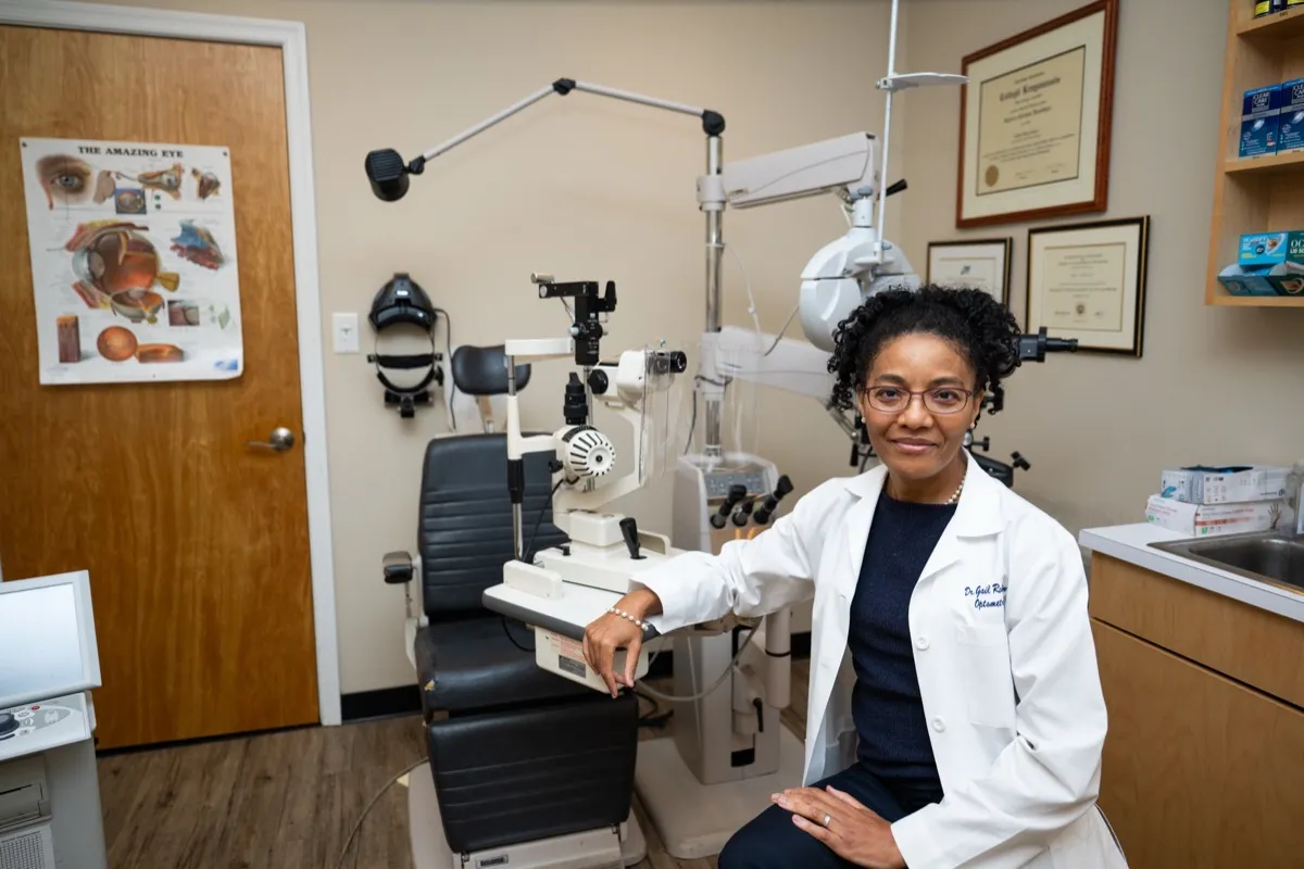 Dr. Gail Robinson in the exam room where contact lens fittings take place.